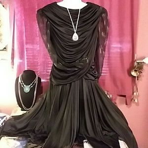 Vintage disco dress with handkerchief hem.